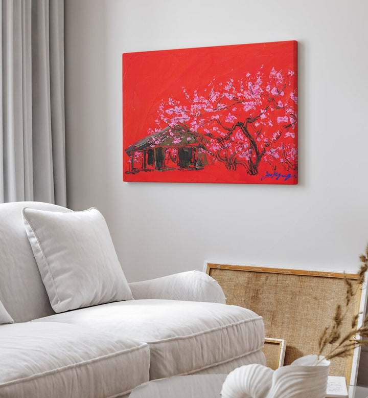 Vibrant PEACH BLOSSOM CANVAS , FLORAL FLOWER PAINTINGS enhancing a cozy living space with a striking red backdrop.