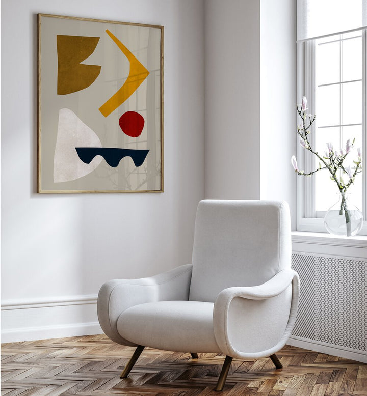 Stylish living room featuring EXPRESSIVE III, GEOMETRIC ART PRINTS framed above a modern chair for artistic ambiance.