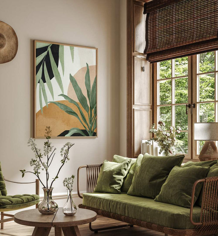 Stylish living room featuring ABSTRACT TROPICAL LEAVES V, BOHO ART PAINTINGS, enhancing bohemian decor beautifully.