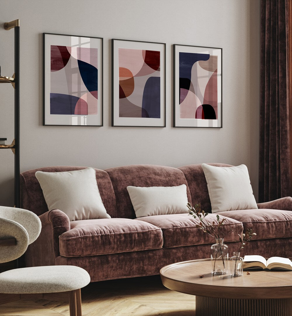 Stylish living room featuring the ABSTRACT HARMONY SET, SET OF 3 PAINTINGS, adding tranquility and inspiration.