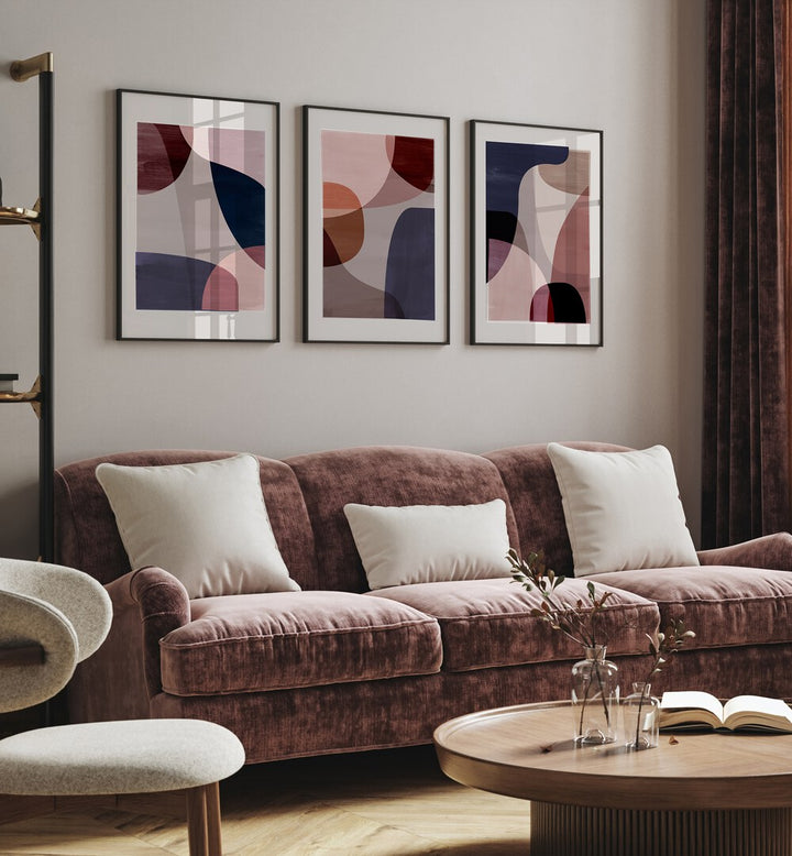 Stylish living room featuring the ABSTRACT HARMONY SET, SET OF 3 PAINTINGS, adding tranquility and inspiration.