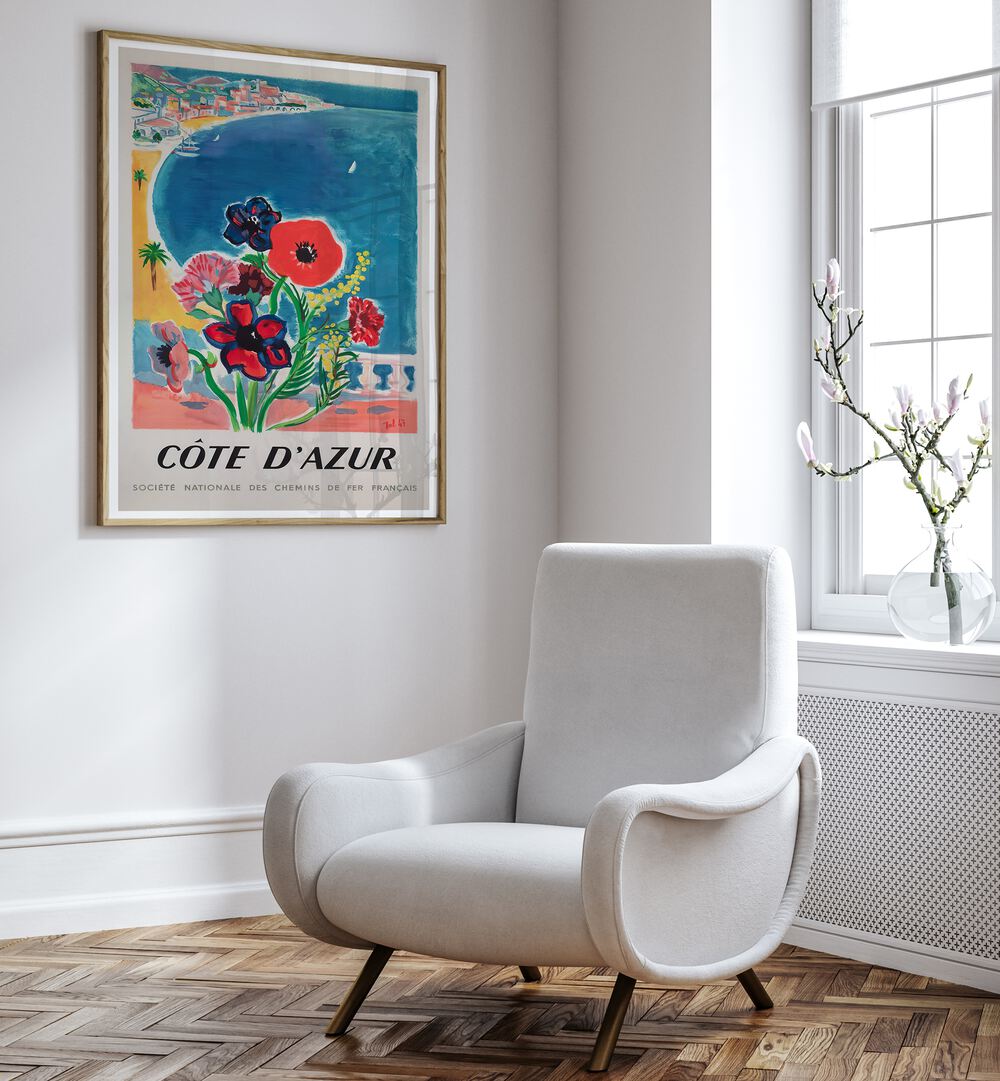 COTE D'AZUR, VINTAGE TRAVEL POSTERS adorn a stylish room, capturing the charm of the French Riviera's allure.