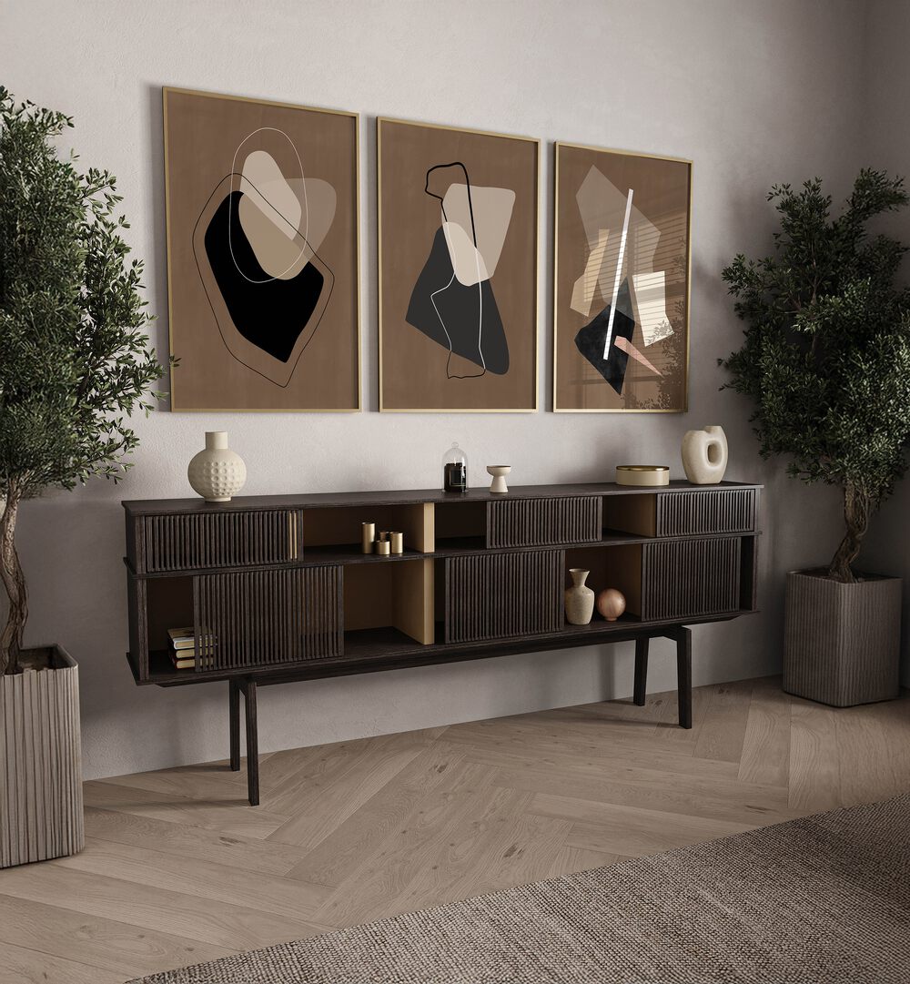 Elevate your decor with the NOCTURNE SHAPES SET, SET OF 3 PAINTINGS, showcasing modern art in a stylish living space.