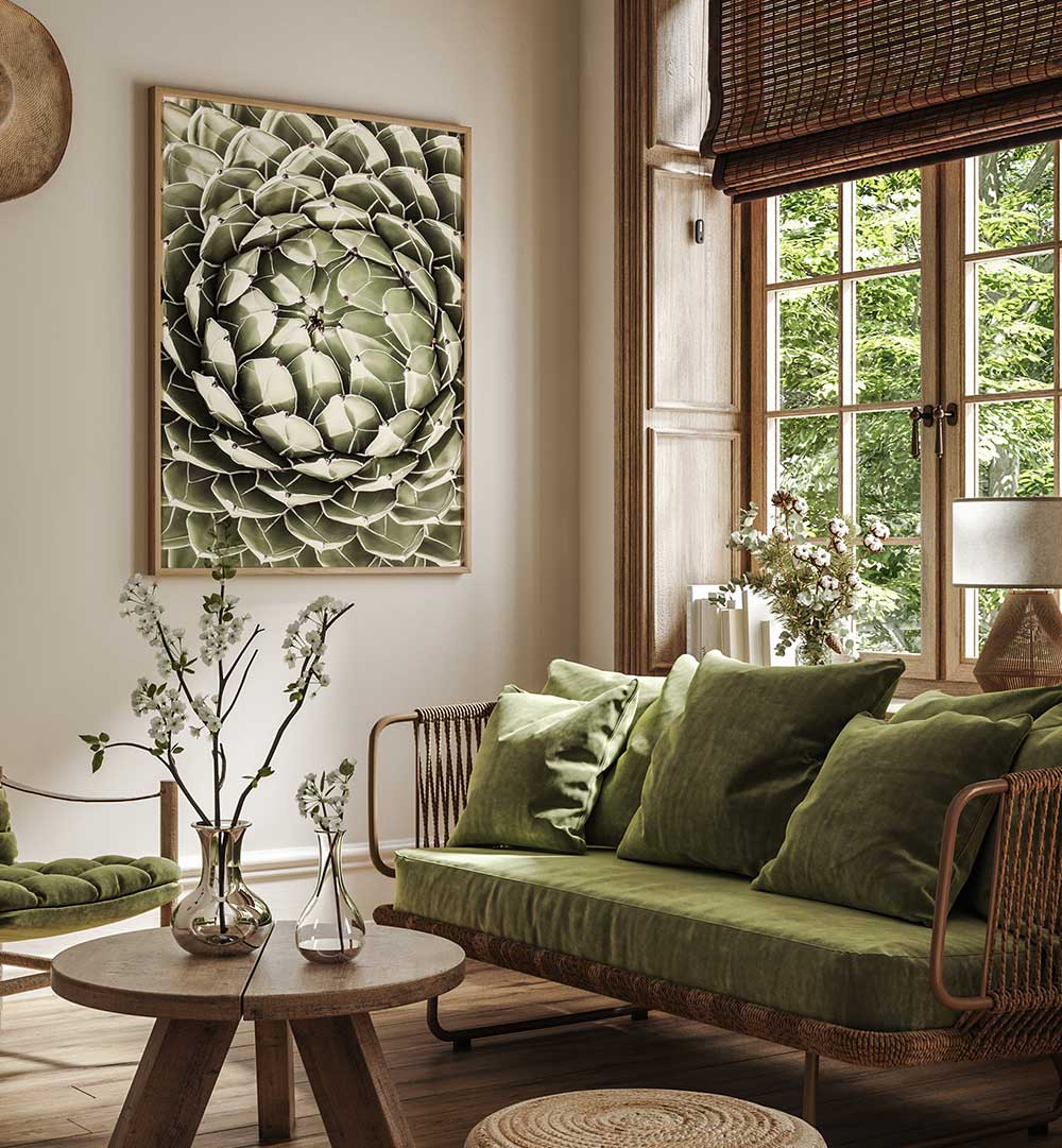 Cozy living room with framed GEOMETRIC SUCCULENT , FLORAL FLOWER PAINTINGS over green velvet sofa