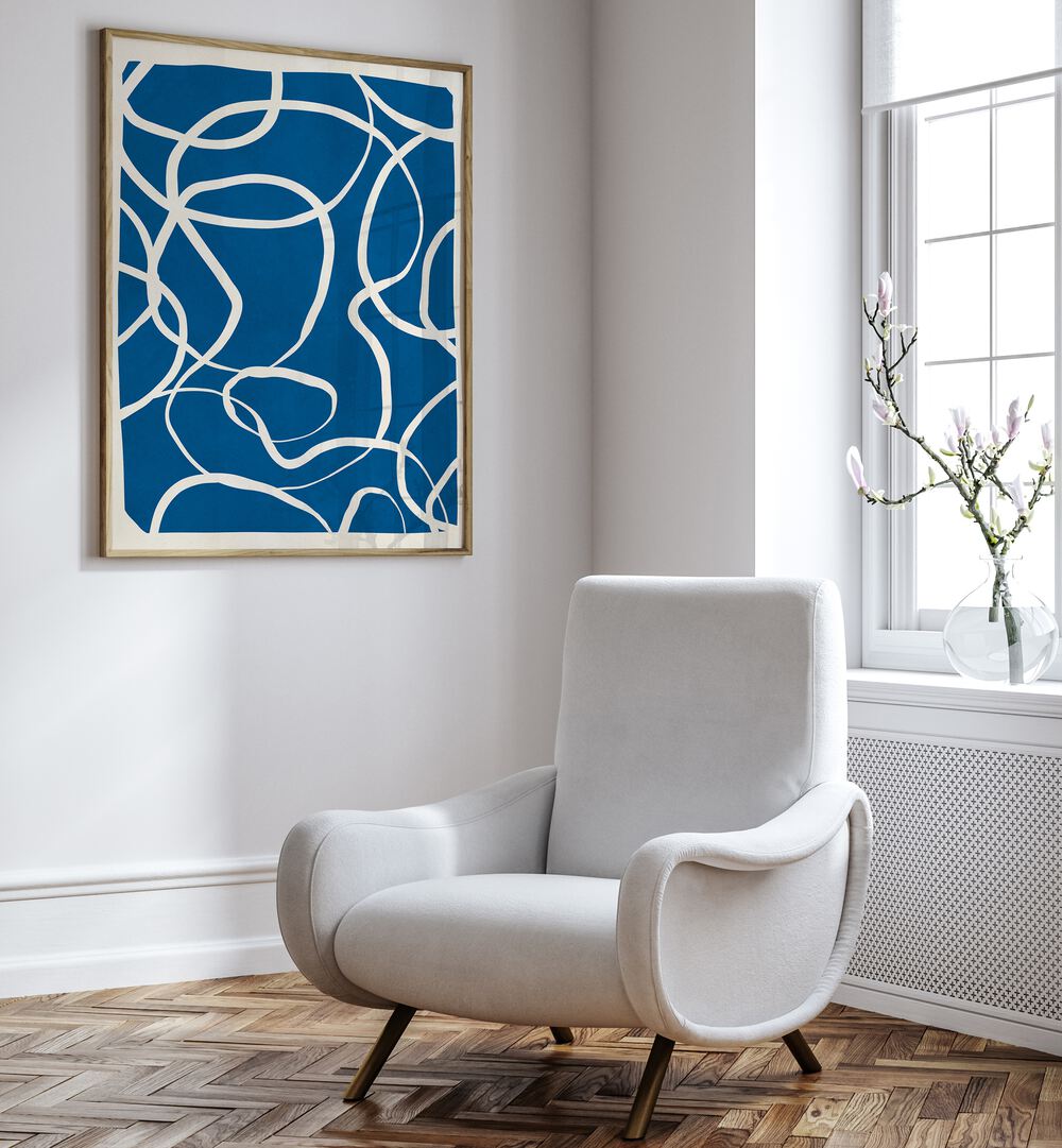 Modern living room featuring EXPRESSIVE LINES IX, ABSTRACT PAINTINGS, showcasing vibrant blue and dynamic white lines.