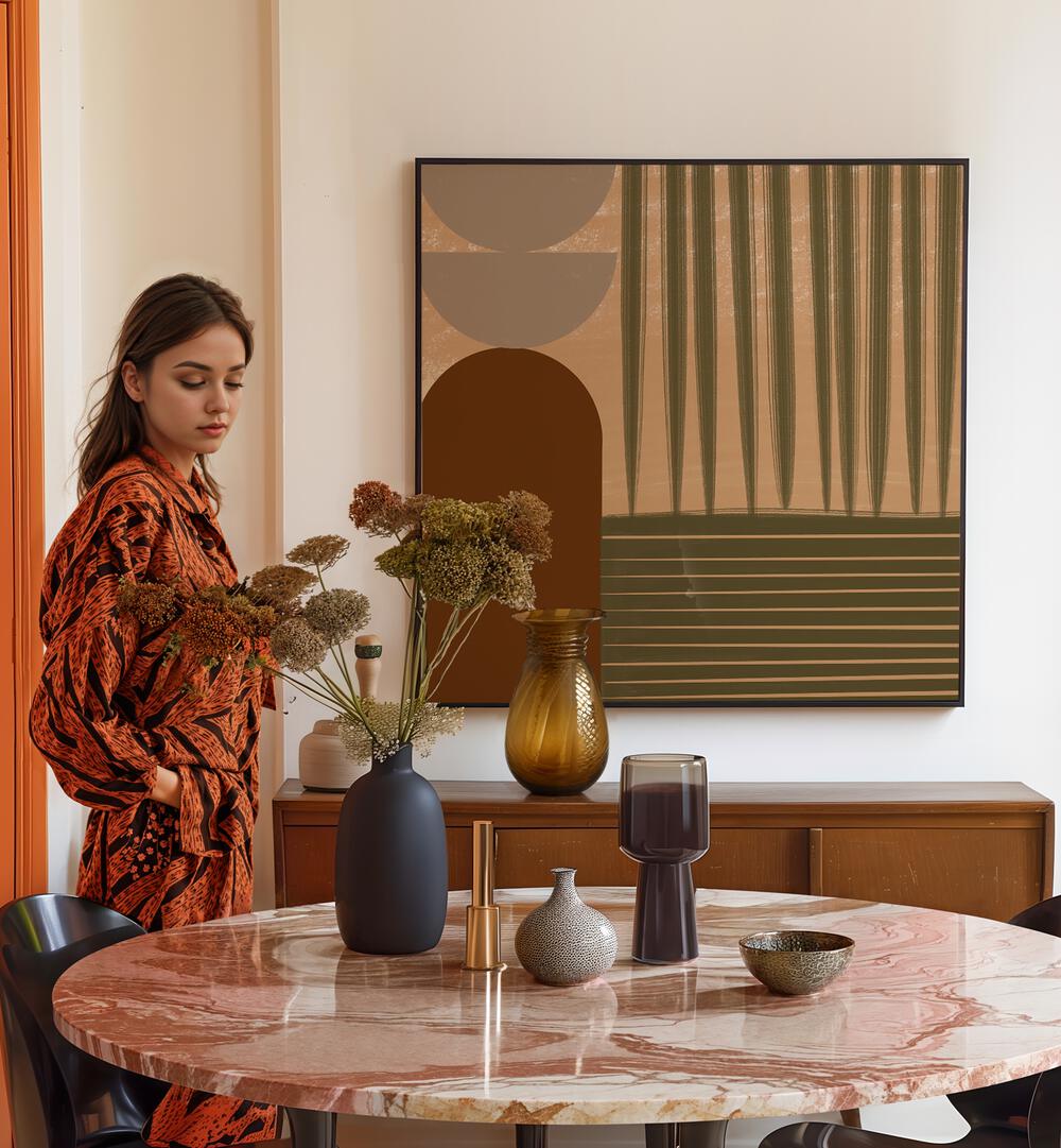 Stylish woman admires FALL GEOMETRIC, BOHO ART PRINTINGS in a modern living space, showcasing elegance and flair.
