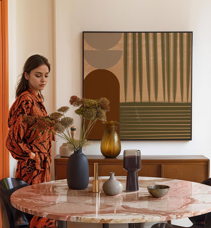 Stylish woman admires FALL GEOMETRIC, BOHO ART PRINTINGS in a modern living space, showcasing elegance and flair.