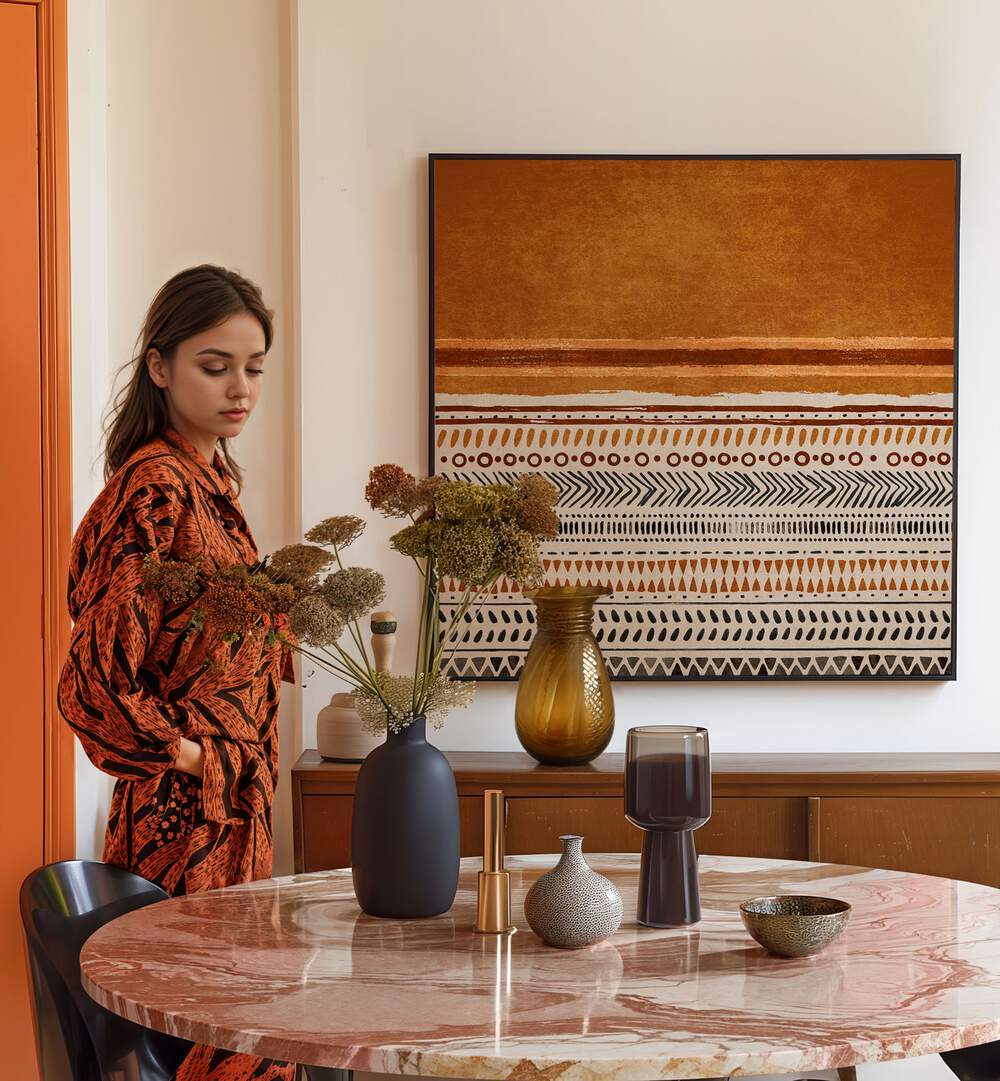 KILIM TURUNCU II, BOHO ART PAINTINGS enrich a stylish interior with vibrant colors and geometric patterns.