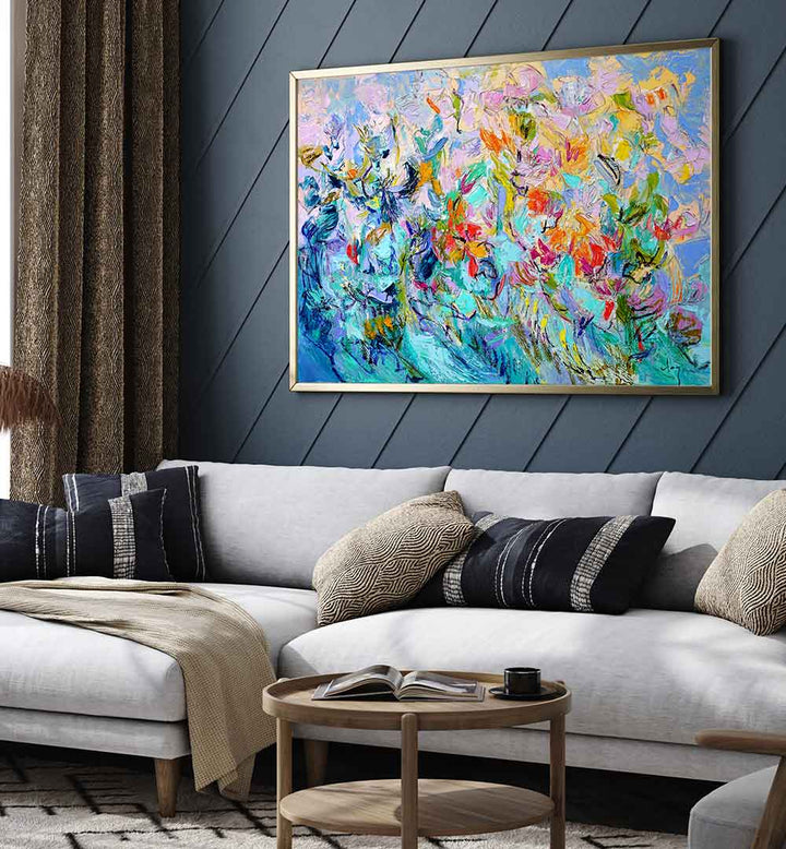 Framed canvas above sofa: RADIANT FLORAL HARMONY , FLORAL FLOWER PAINTINGS with vibrant abstract blooms