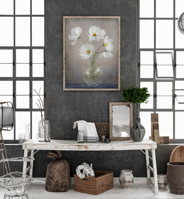 Elegant SIMPLY COSMOS, FLORAL FLOWER PAINTINGS brighten a stylish interior with fresh white flowers in a vase.