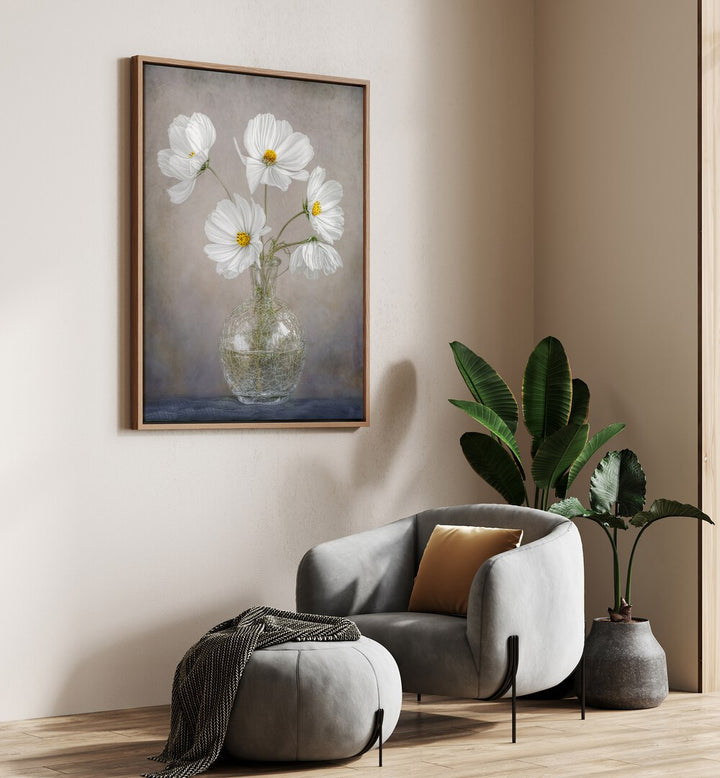 Elegantly showcasing SIMPLY COSMOS, FLORAL FLOWER PAINTINGS with vibrant white flowers in a stylish vase.