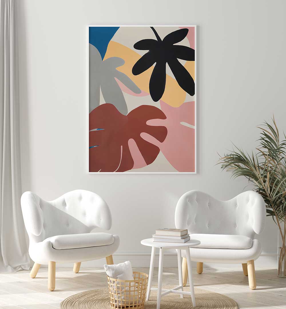 JUNGLE VIBES , FLORAL FLOWER PAINTINGS with bold abstract leaves brightening a modern living room setting.