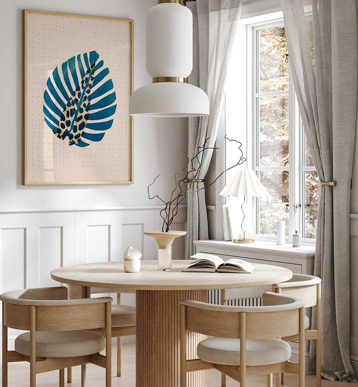 LEOPALM , FLORAL FLOWER PAINTINGS featuring a modern blue leaf design enhancing a stylish dining room ambiance