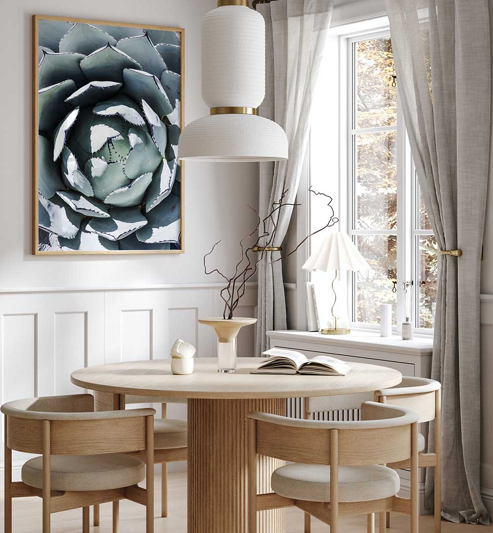 AGAVE SPIRAL DANCE , FLORAL FLOWER PAINTINGS framed agave artwork over Scandinavian dining table in bright neutral room