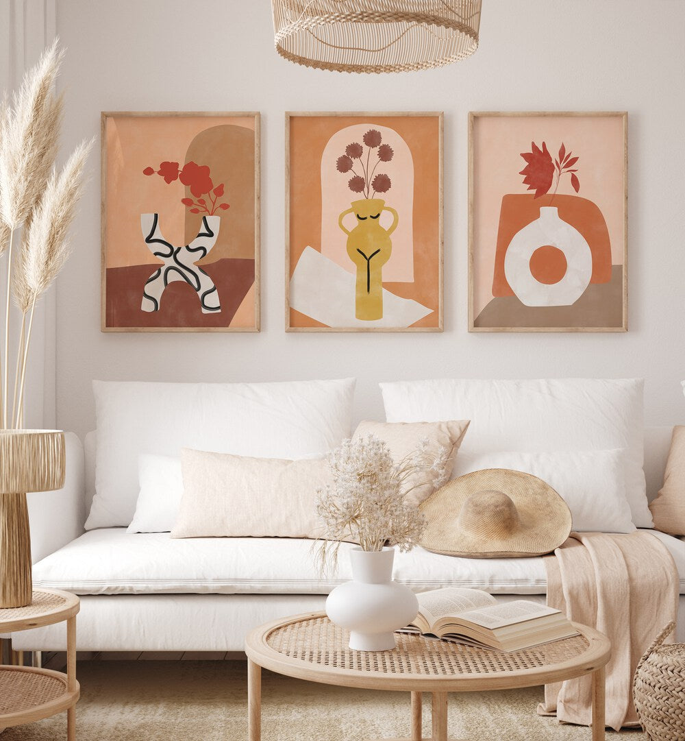 Stylish living room featuring the CERULEAN BLISS SET, SET OF 3 PAINTINGS for a calming home décor accent.