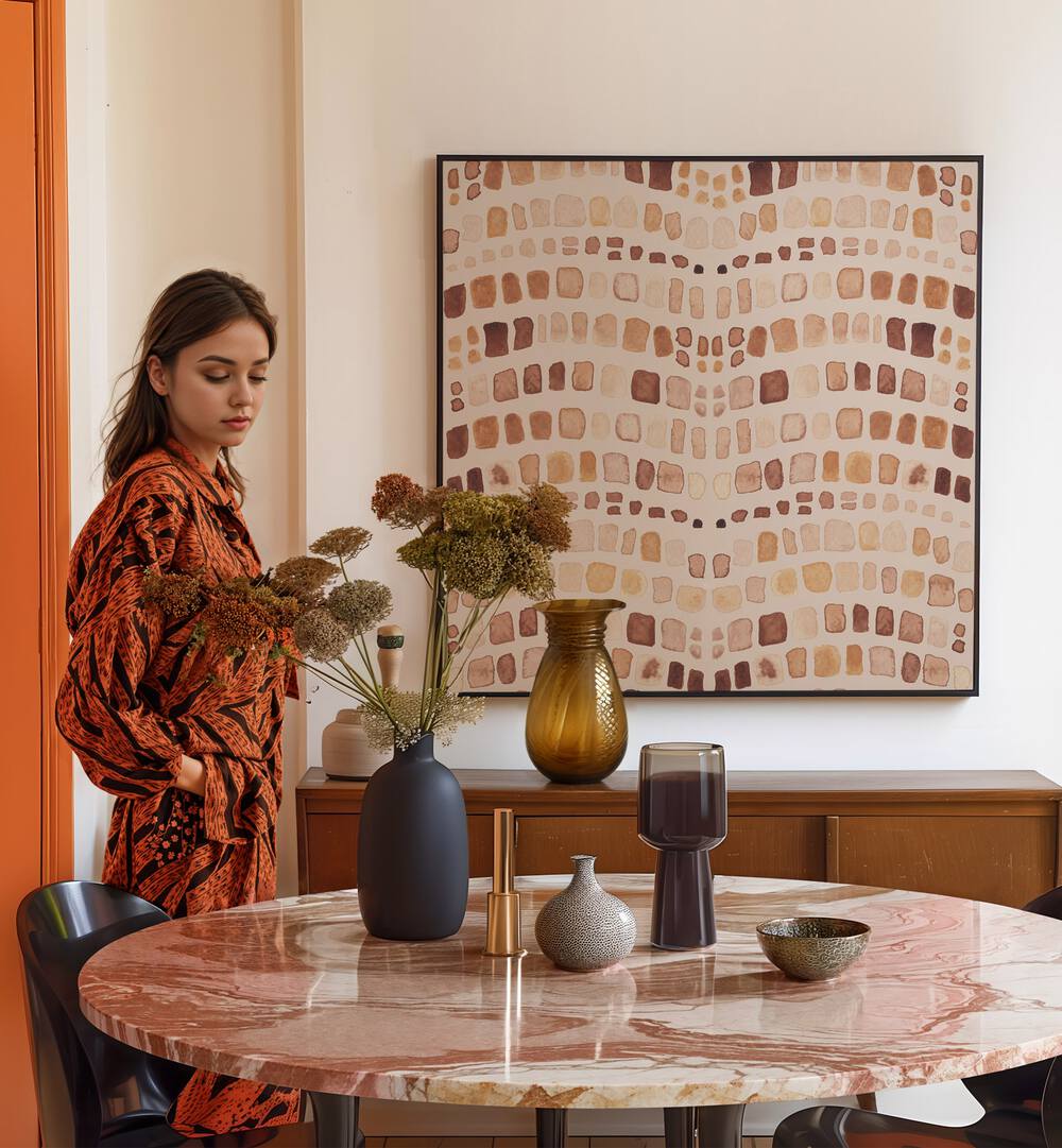 Stylish woman in an exotic outfit beside ANIMAL PRINT, BOHO ART PAINTINGS, enhancing modern home decor.