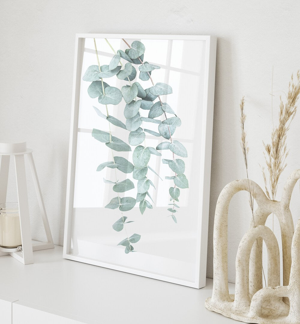 EUCALYPTUS I, FLORAL FLOWER PAINTINGS features lush eucalyptus leaves, perfect for enhancing your living space's ambiance.