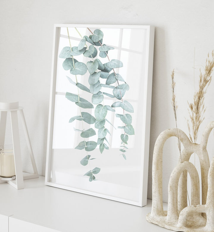 EUCALYPTUS I, FLORAL FLOWER PAINTINGS features lush eucalyptus leaves, perfect for enhancing your living space's ambiance.