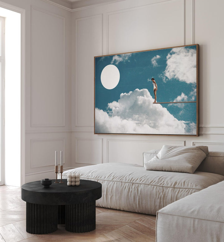 Explore the SURREAL REVERIE, SURREAL ART PRINTS by UNDERDOTT, featuring a dreamlike scene with clouds and a figure.