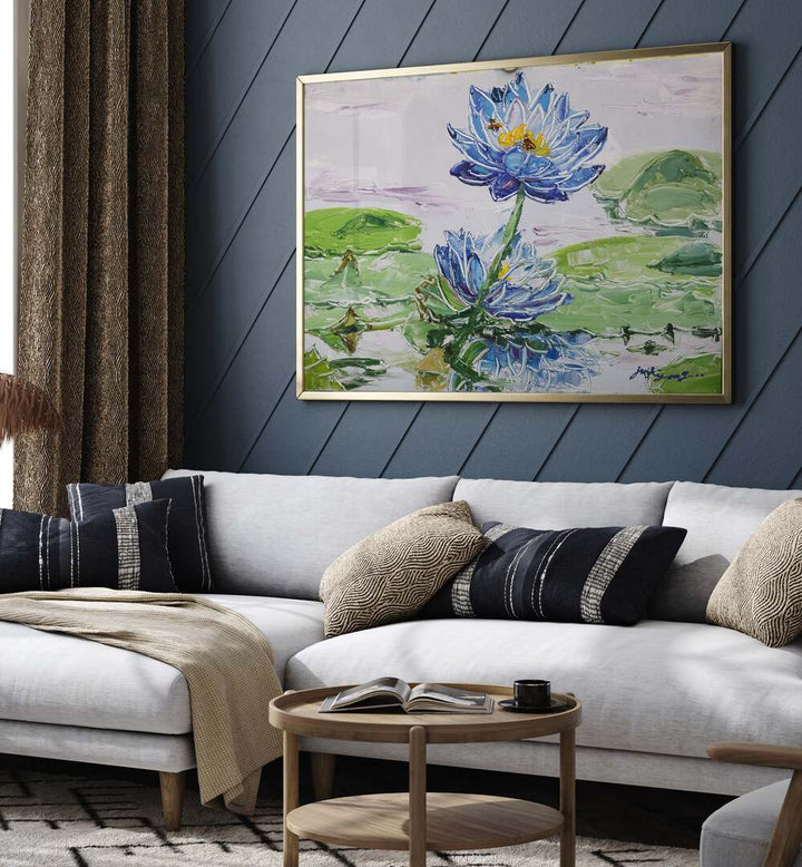 Vibrant LOTUS FLOWER CANVAS, FLORAL FLOWER PAINTINGS enhancing a stylish living room with blue tones and greenery.