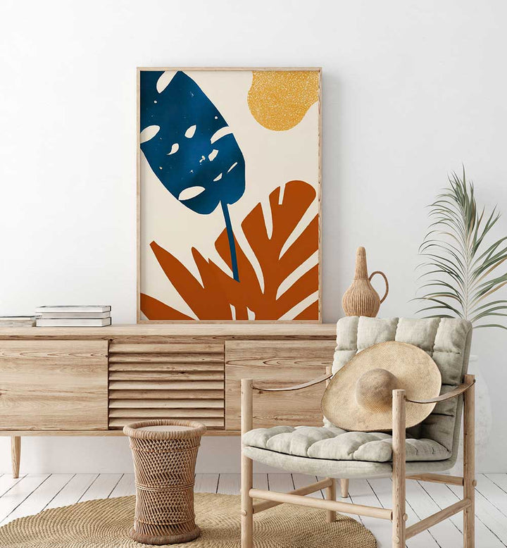 PRIMARY PALMS , FLORAL FLOWER PAINTINGS with bold blue and orange leaves in a modern living room setting by Artify Studio.