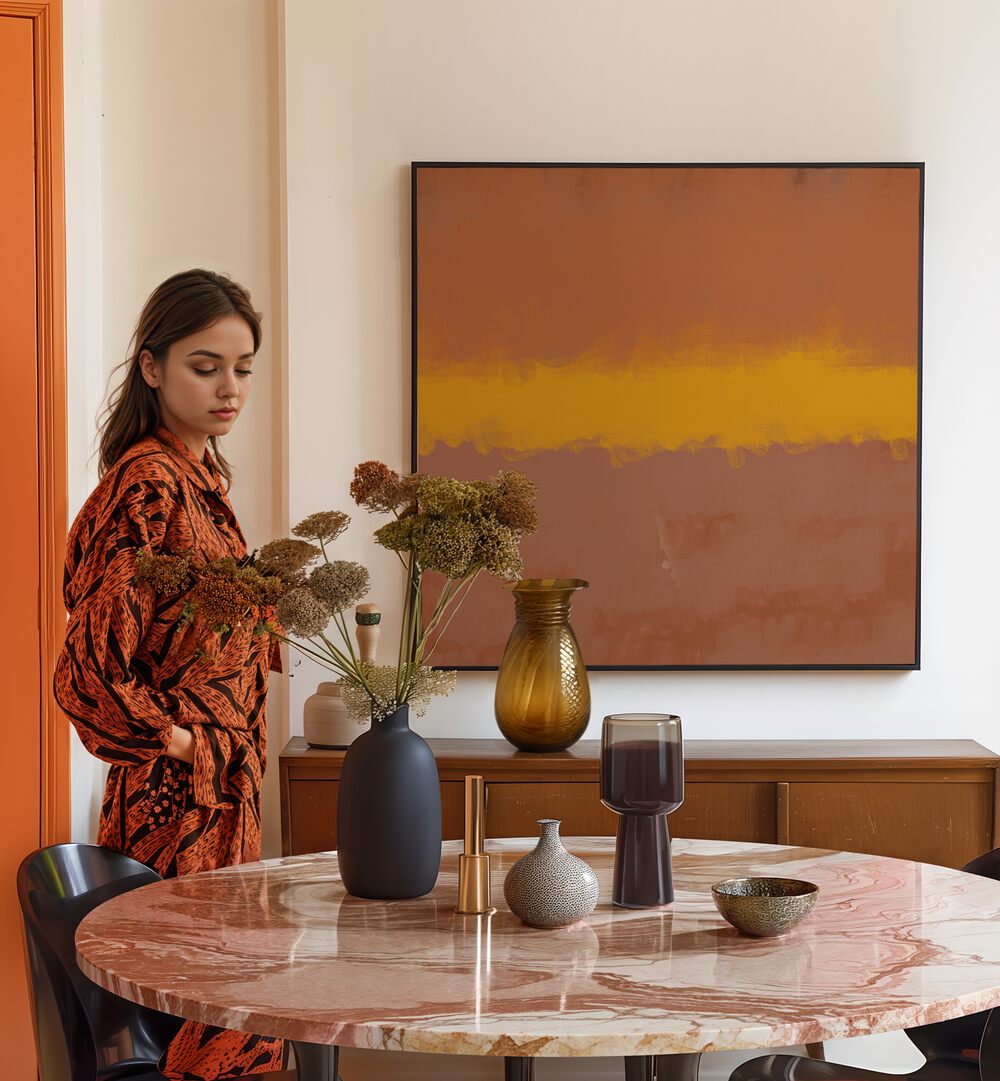 Stylish woman beside a table with decor and the MODERN CALM, ABSTRACT PAINTINGS adding tranquility to the space.
