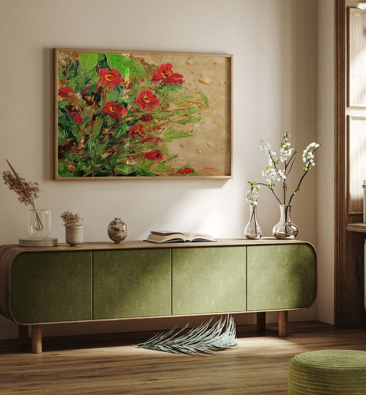 Brightly colored MARIGOLD CANVAS III, FLORAL FLOWER PAINTINGS displayed above a stylish green cabinet in a cozy room.