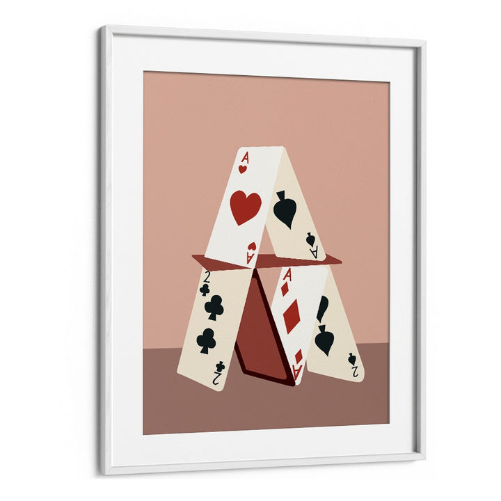 A HOUSE MADE OF CARDS, GAMING POSTERS by Uma Gokhale showcases a creative card structure in a stylish frame.