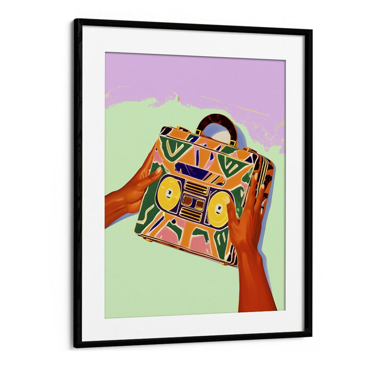 Colorful artwork of a vintage suitcase in a frame, showcasing "A SUITCASE FULL OF MEMORIES, FASHION POSTERS" by Uma Gokhale.