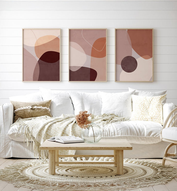 Stylish living room featuring the ABSTRACT MOCHA MIRAGE SET, SET OF 3 PAINTINGS for a modern touch.