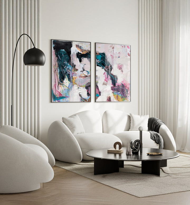 Stylish living room featuring ABSTRACT STATEMENT STROKES, SET OF 2 PAINTINGS, enhancing contemporary decor beautifully.