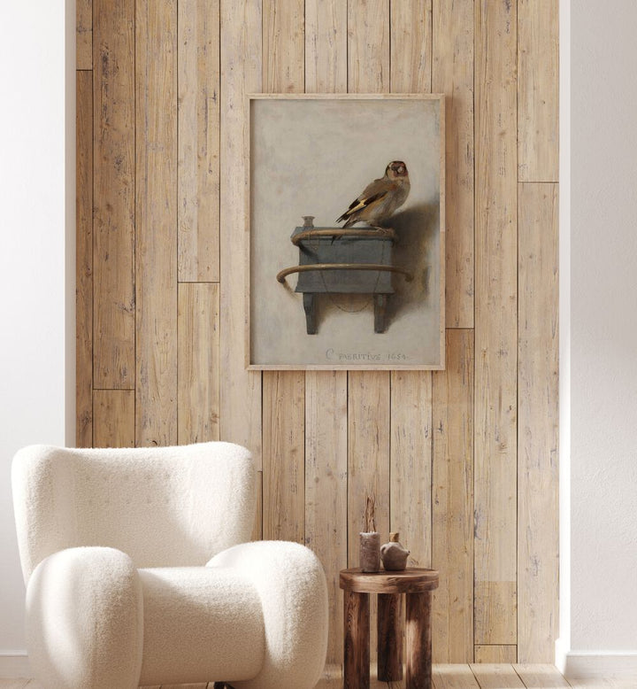 Admire the ALTIN ISPINOZ TABLOSU (1654) VINTAGE PAINTINGS showcasing a goldfinch on a wooden table in a cozy setting.