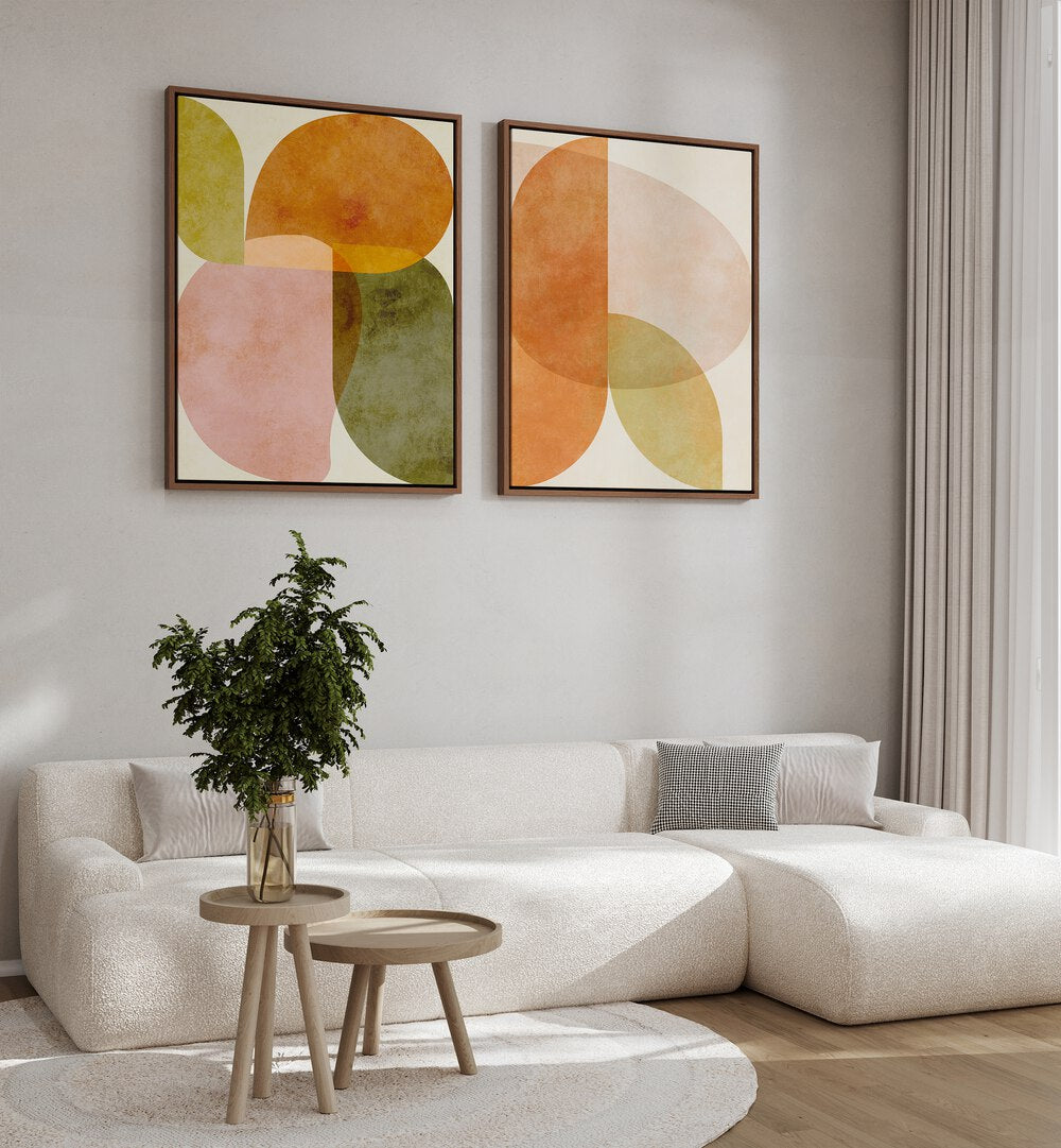 Stylish living room featuring the AQUA SHAPES SET, SET OF 2 PAINTINGS, enhancing tranquility and elegance.