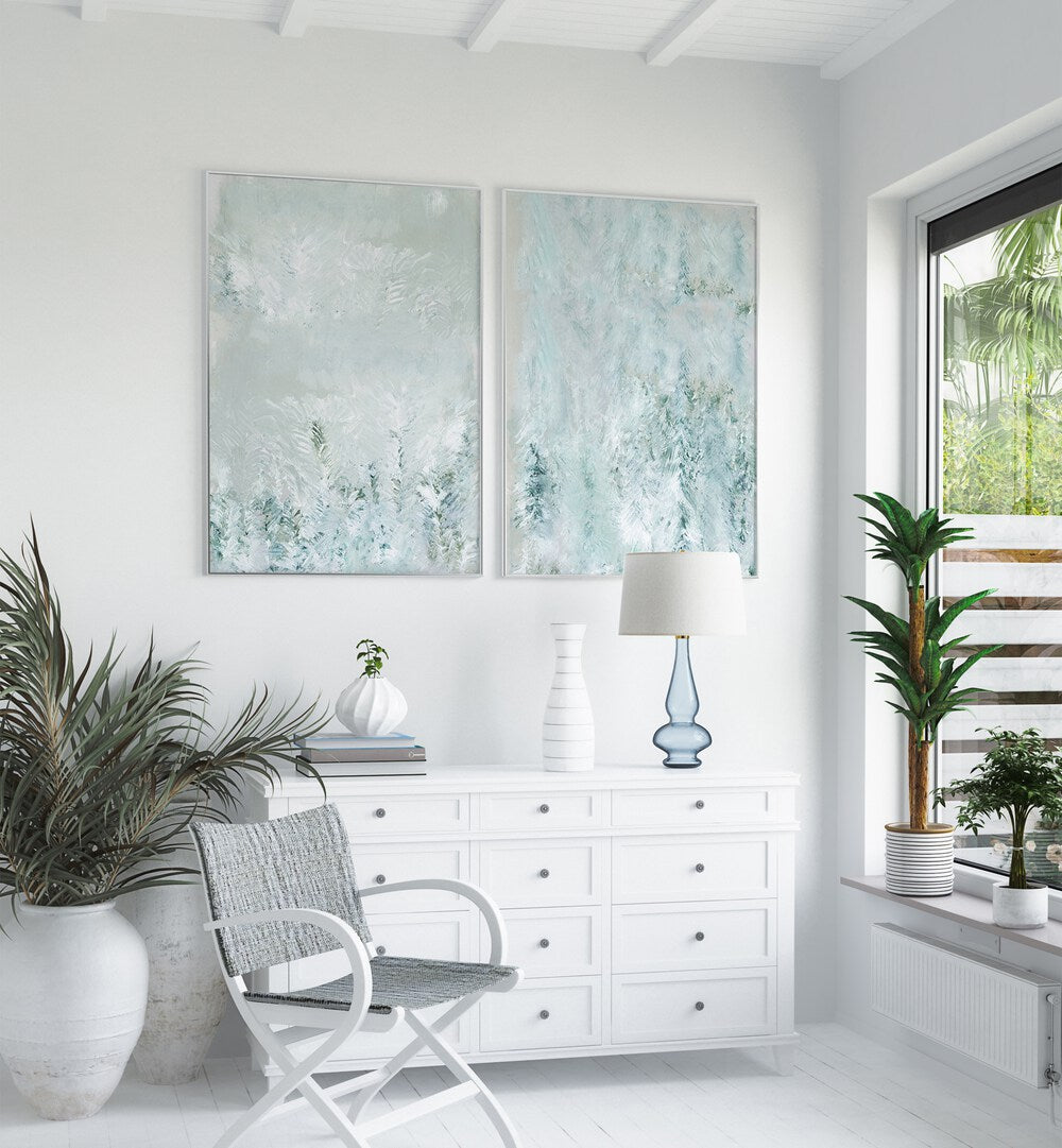 Elevate your decor with the ARCTIC BREEZE SET, SET OF 2 PAINTINGS, featuring serene winter-inspired designs.