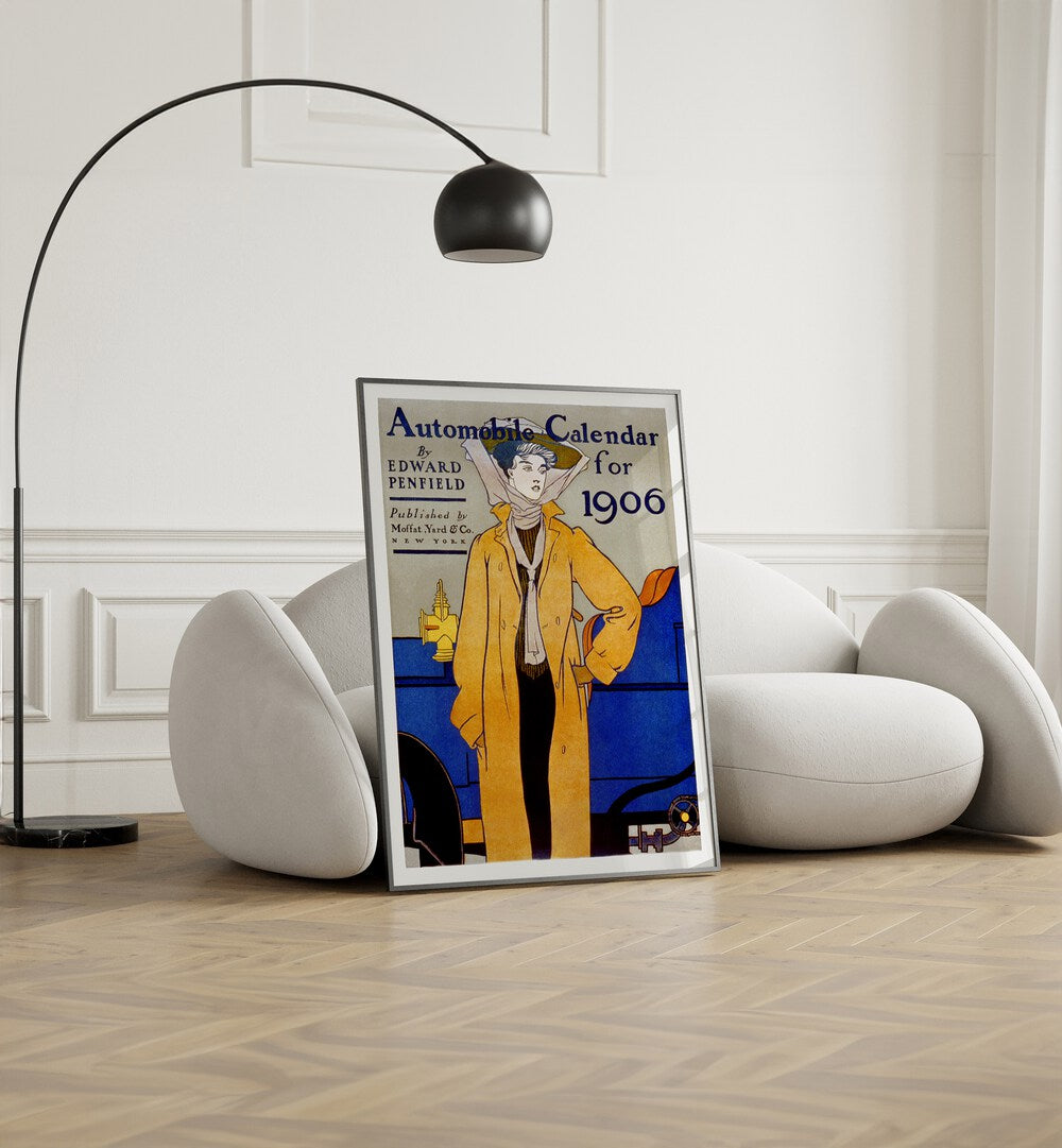 Automobile Calendar For 1906 Ca. 1905 Vintage Paintings in Black Plain Frame placed on the floor beside a sofa