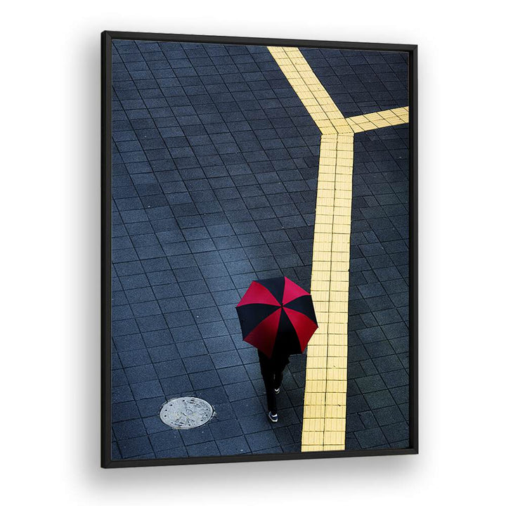 Urban scene featuring a person with a red and black umbrella, perfect for Y, PHOTOGRAPHY PRINTS enthusiasts.