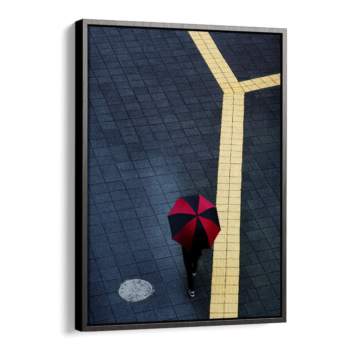 Explore urban energy with Y, PHOTOGRAPHY PRINTS featuring a striking image of a person with an umbrella on city streets.