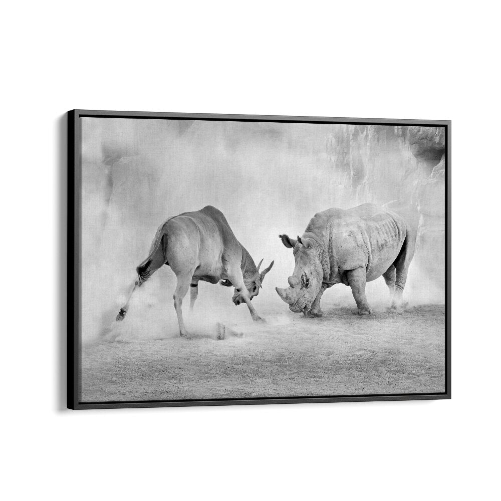 Stunning COMBAT, PHOTOGRAPHY PRINTS showcasing a dramatic wildlife encounter between a rhino and antelope.