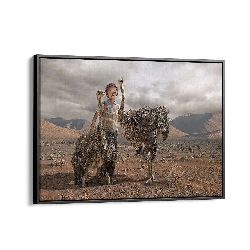 Surreal OSTRICH BOY, PHOTOGRAPHY PRINTS featuring a child with ostriches in a whimsical desert landscape.