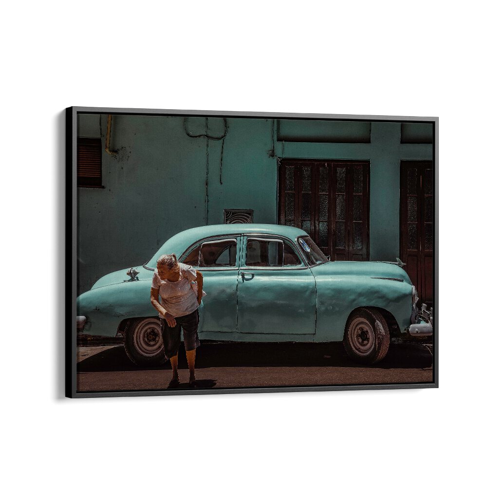 A person interacts with a classic car against vibrant urban backdrops in PASSING STREET, PHOTOGRAPHY PRINTS series.