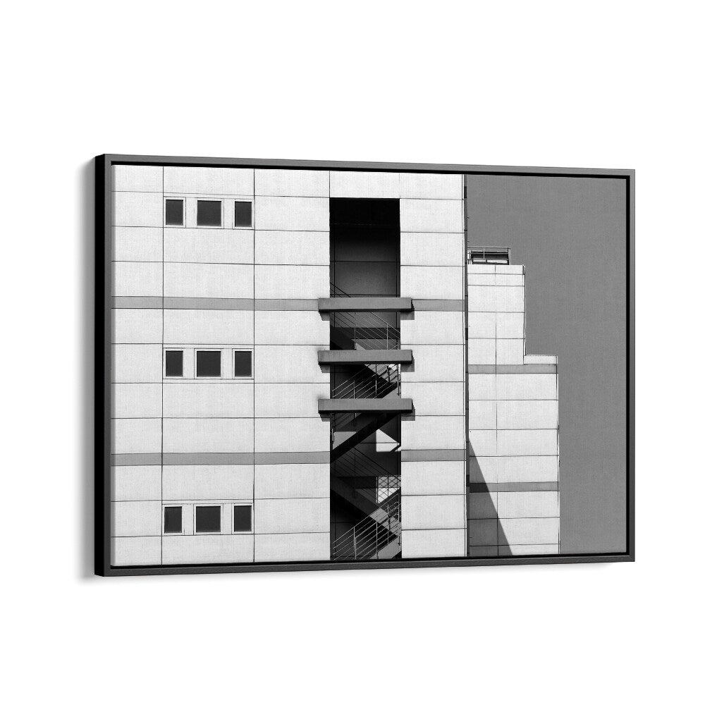 Minimalist architecture captured in UNTITLED III, PHOTOGRAPHY PRINTS, showcasing urban design's striking details.