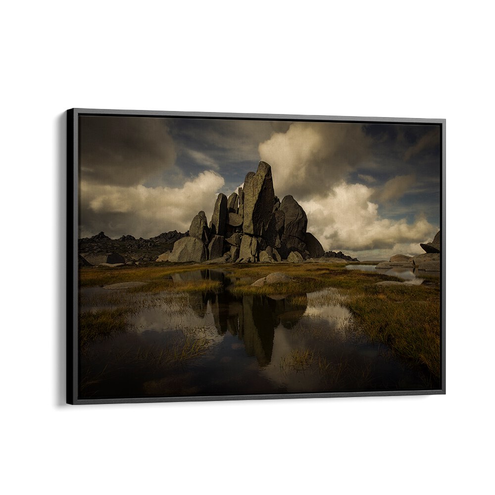 Stunning STANDING ALONE, PHOTOGRAPHY PRINTS showcasing serene landscapes and majestic rock formations reflecting in water.