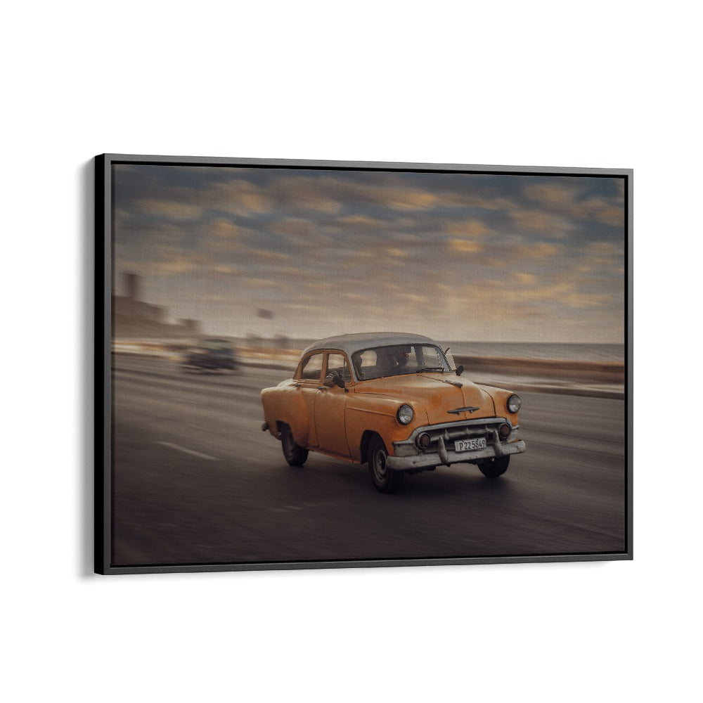 Capture the essence of street life with MALECON VII, PHOTOGRAPHY PRINTS featuring a classic car in motion.
