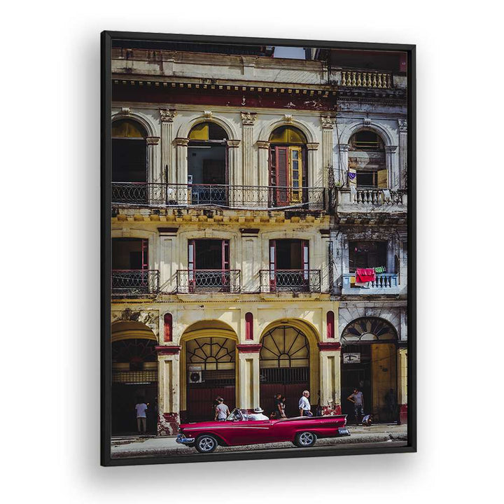 Vibrant red car parked on a bustling Havana street, perfect for "RED CAR IN HABANA STREET, PHOTOGRAPHY PRINTS."