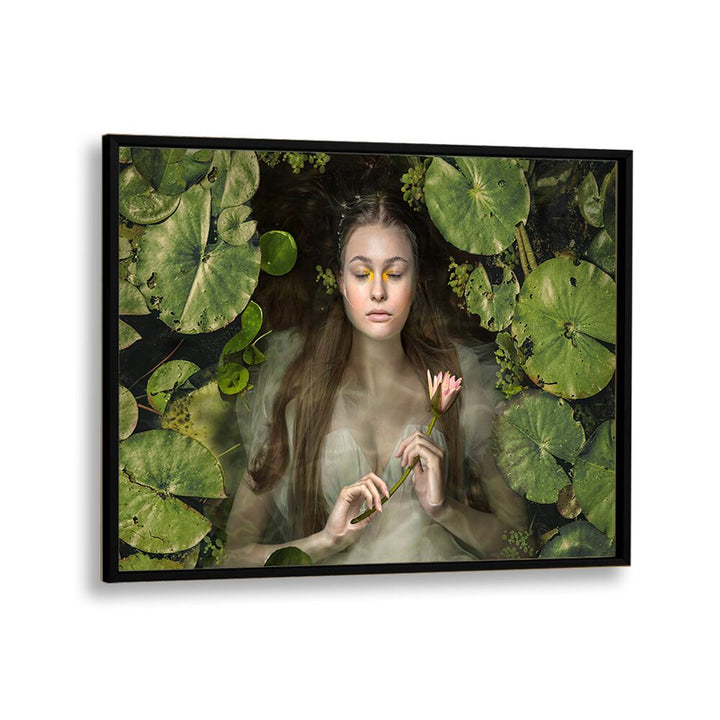 SILENT DREAM, PHOTOGRAPHY PRINTS featuring a serene woman surrounded by lily pads, evoking surreal beauty and imagination.