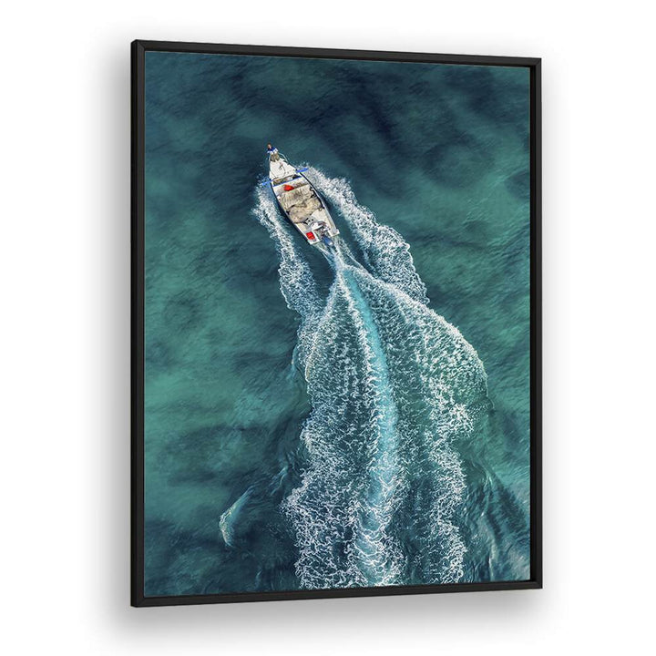 Stunning aerial shot of a boat gliding through clear waters, perfect for AERIAL PURSUIT, PHOTOGRAPHY PRINTS.