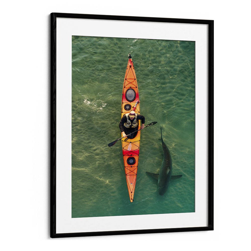 A kayaker glides above a shark in clear waters, showcasing the INTIMATE SHARK ENCOUNTER, PHOTOGRAPHY PRINTS experience.
