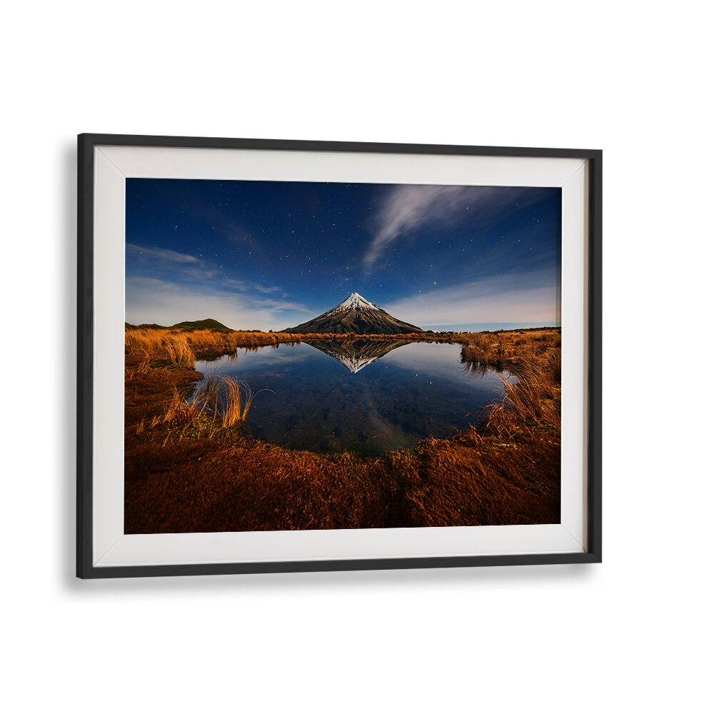 Stunning Mount Taranaki landscape reflecting in calm water, perfect for MOUNT TARANAKI, PHOTOGRAPHY PRINTS collection.