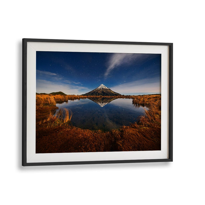 Stunning Mount Taranaki landscape reflecting in calm water, perfect for MOUNT TARANAKI, PHOTOGRAPHY PRINTS collection.