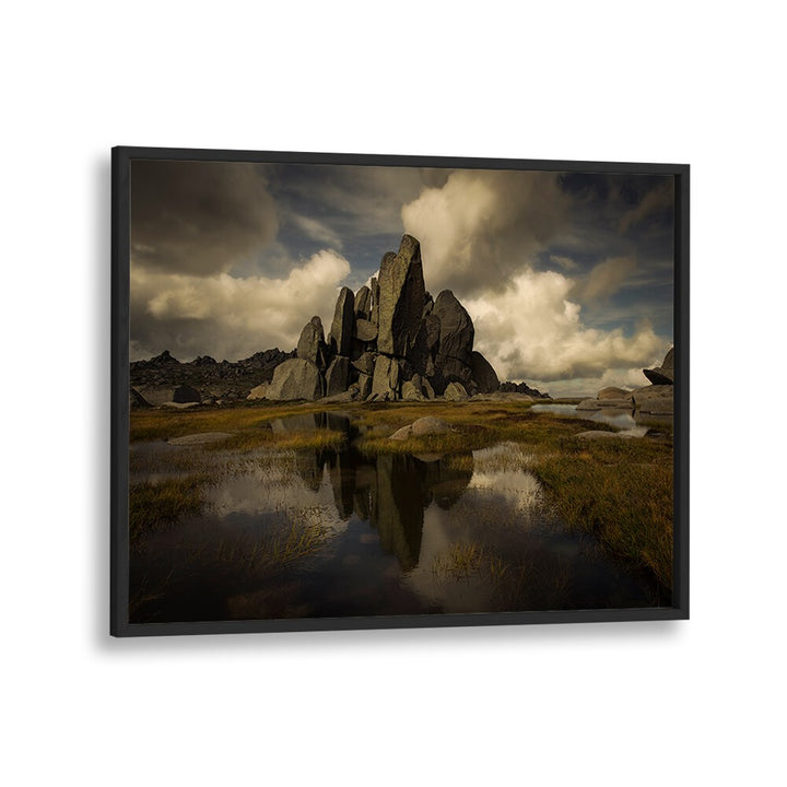 Stunning STANDING ALONE, PHOTOGRAPHY PRINTS showcasing rugged rocks reflecting in serene waters, enhancing nature's beauty.